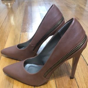 A beautiful pair of brown zippered pumps